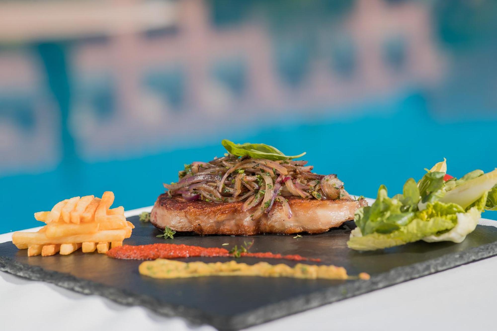 Grand Mogador Agdal & Spa Marrakesh Eksteriør bilde A steak prepared with the method of cooking